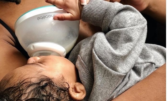 baby being fed with nanobebe breastmilk bottle  getting enough milk
